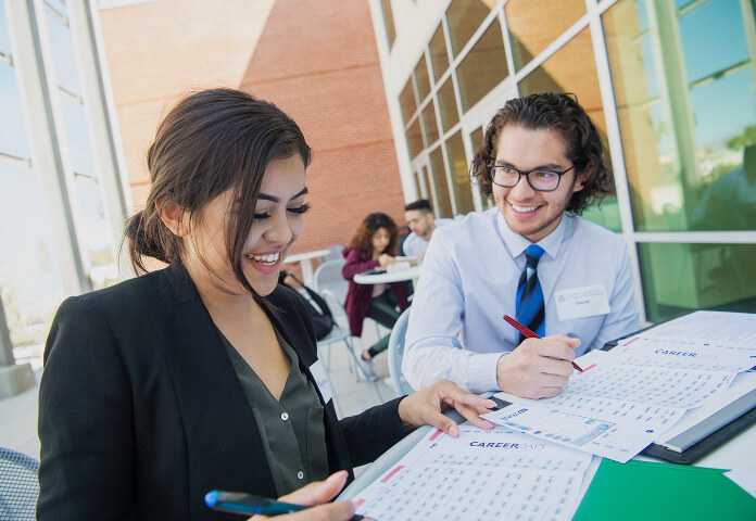 UArizona business students working outside