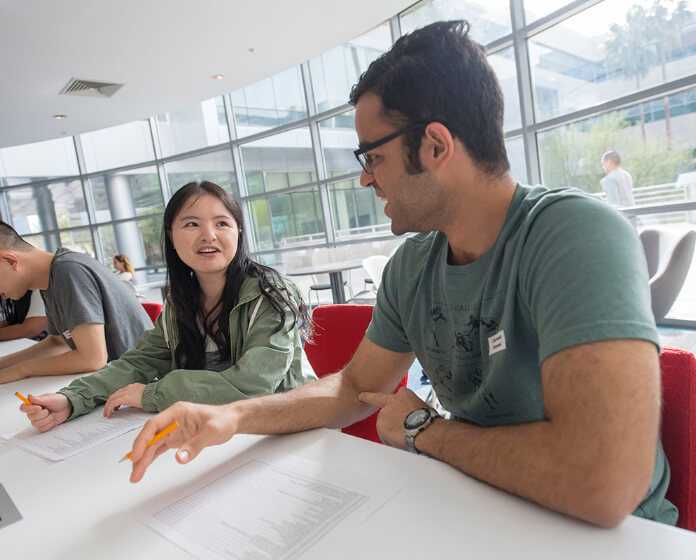 two students studying in class