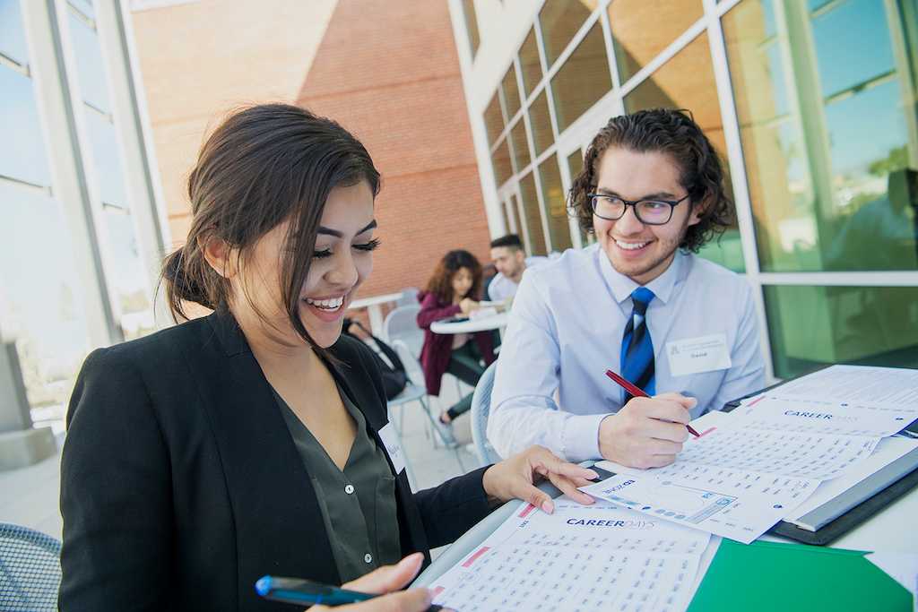 students studying at a table