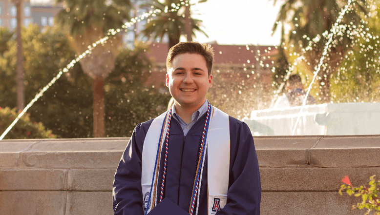 Andrew in his graduation gown
