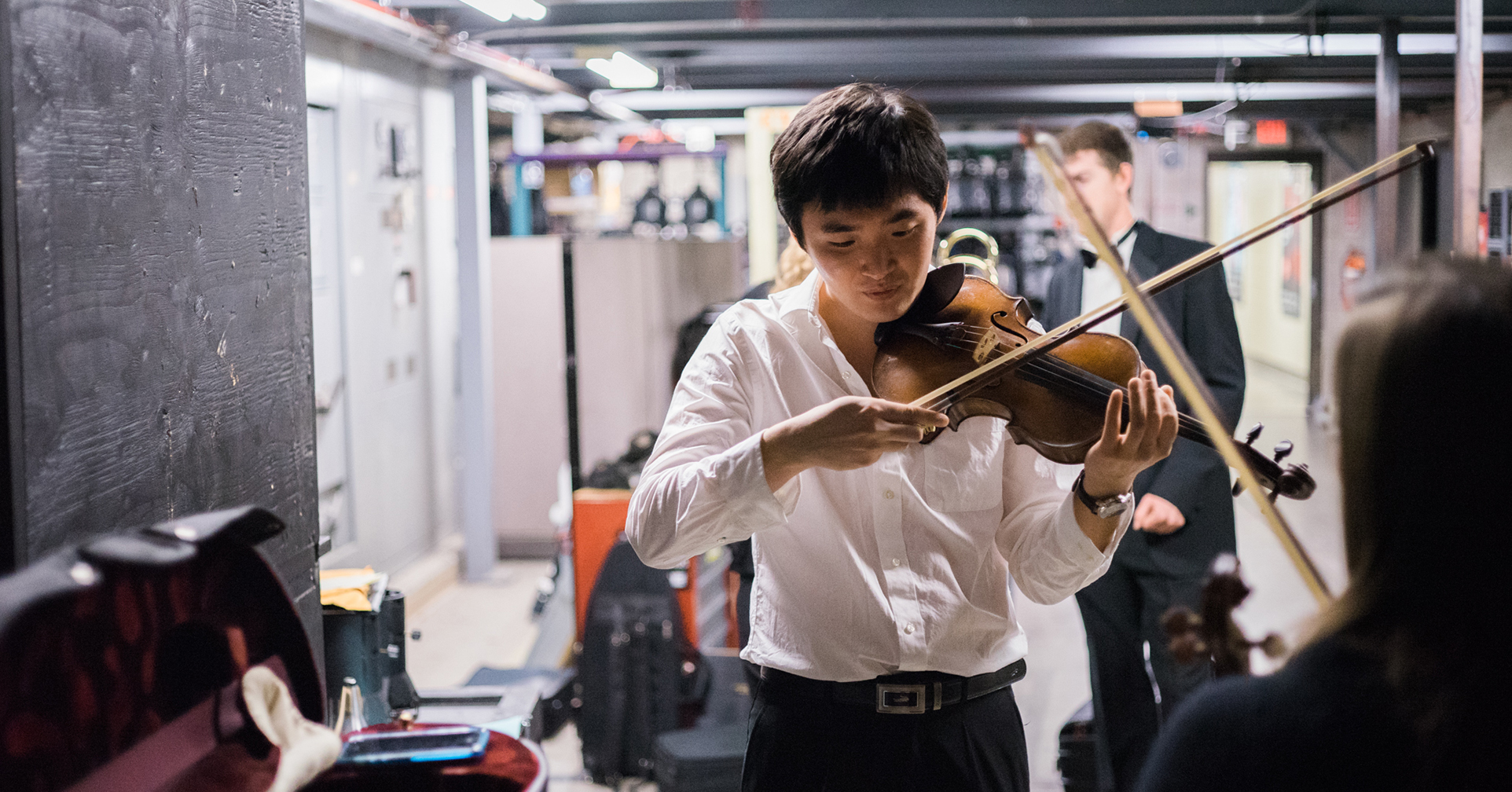 student with a violin