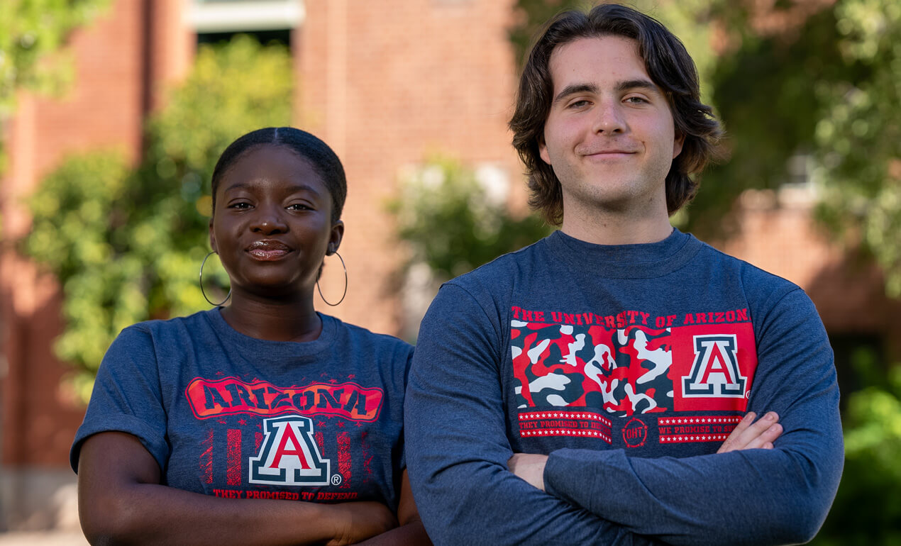 two students wearing University of Arizona clothing