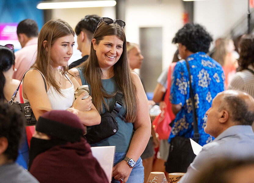 Mom and daughter at a student fair