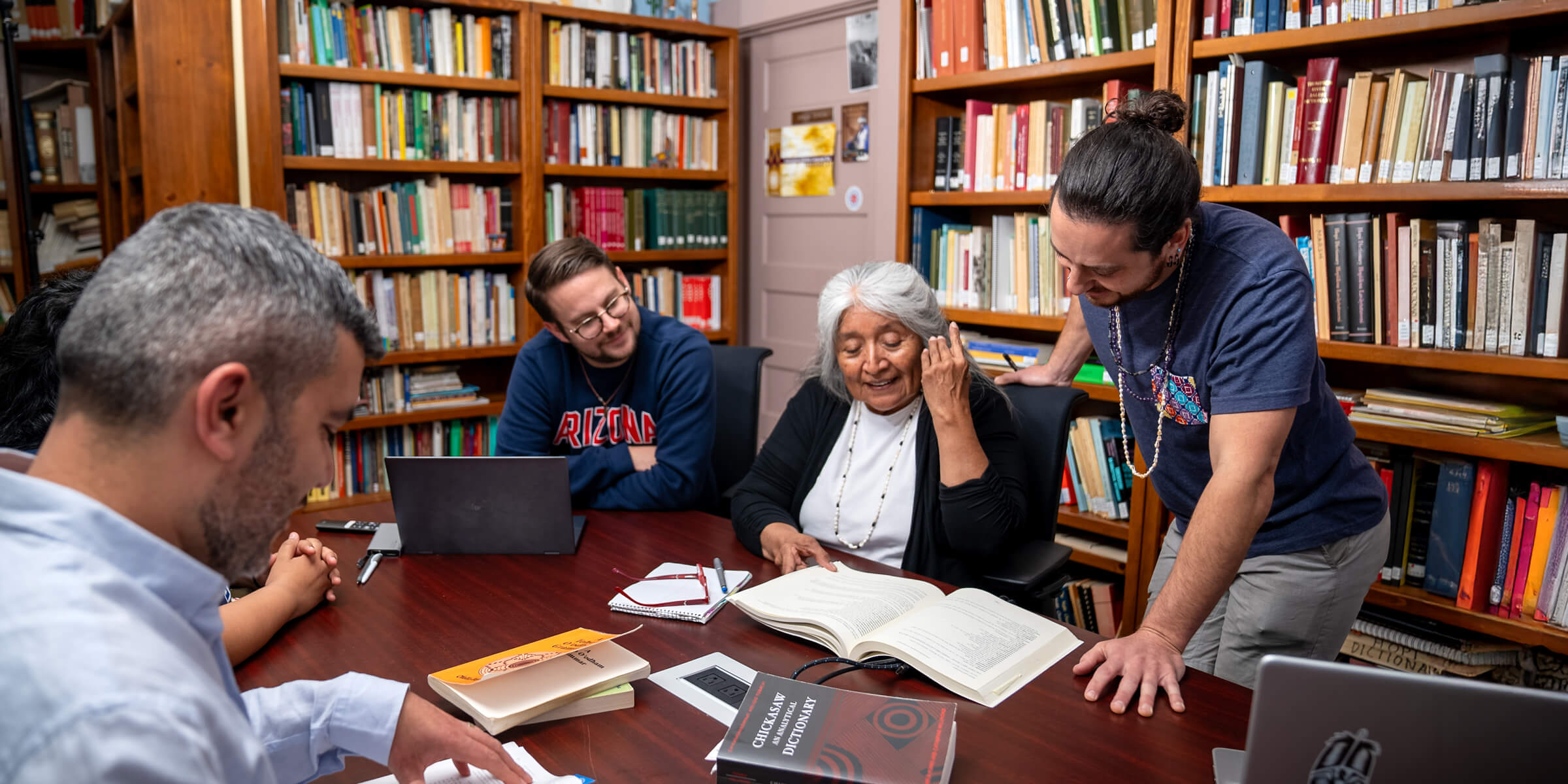 professor and students talking