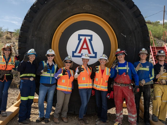 Mining and engineering leaders wear safety vests