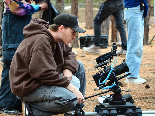 A filmmaker operates a camera