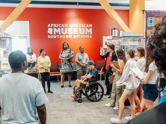 A group of students gather at the African American Museum of Southern Arizona