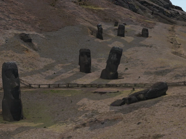 an animated scene from a digital 3D model of statues on Easter Island at sunrise