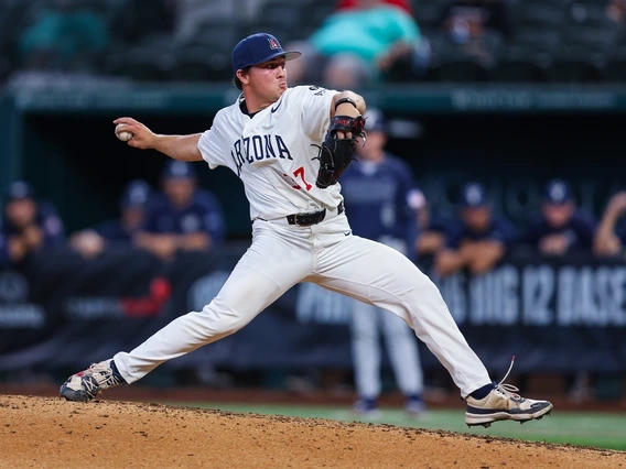 Tony Pluta stepping off the mound during a baseball pitch
