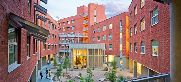 Exterior of a University of Arizona on-campus dorm with a courtyard center.